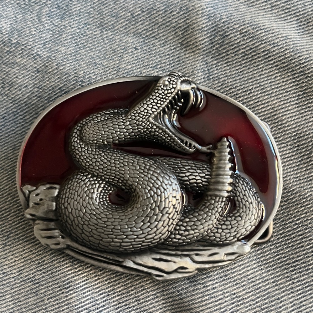 Silver Tone Rattle Snake Belt Buckle With Red Background